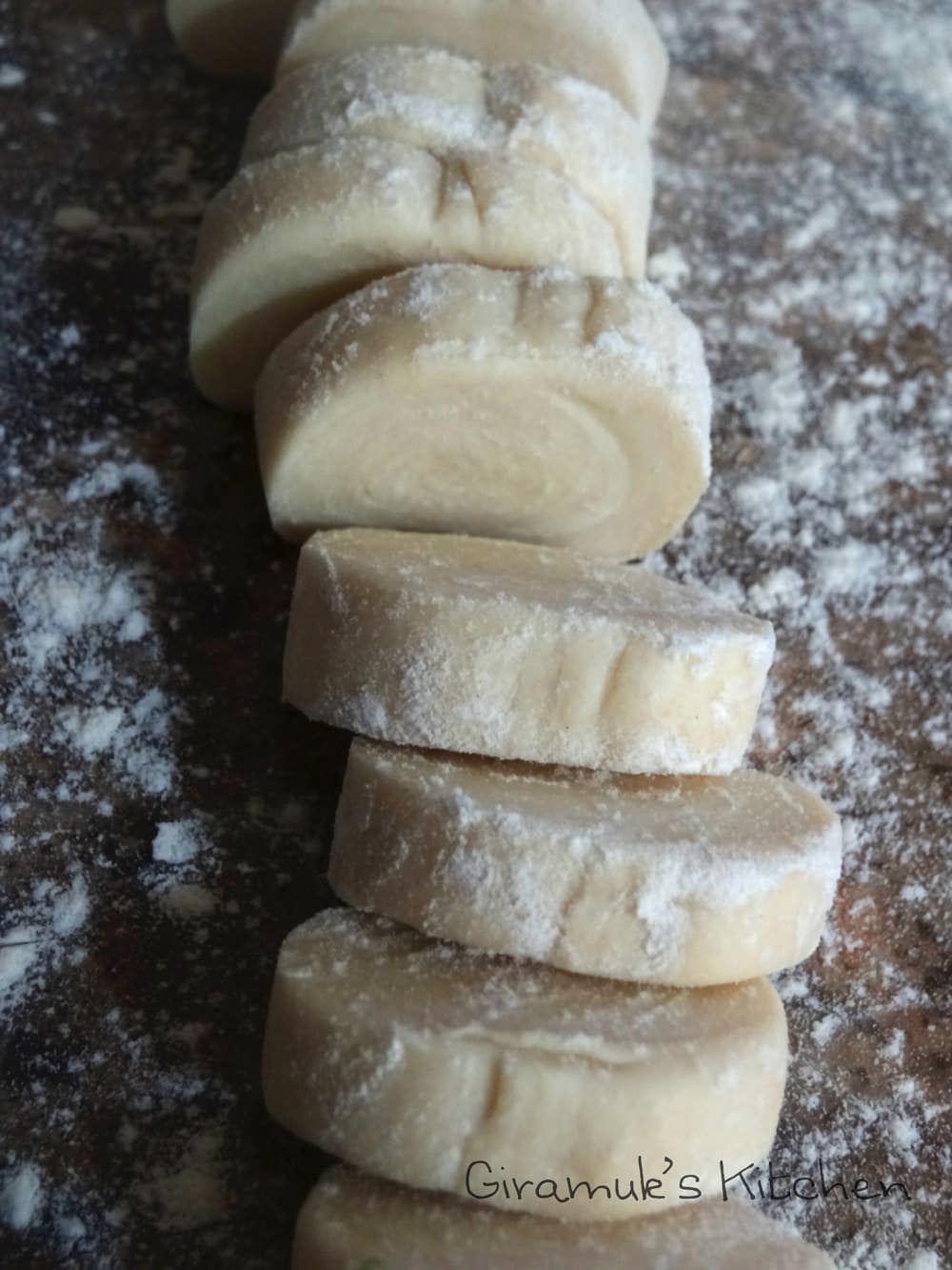 Puff pastry cut into small discs to make the tomato and goat cheese tartlets.