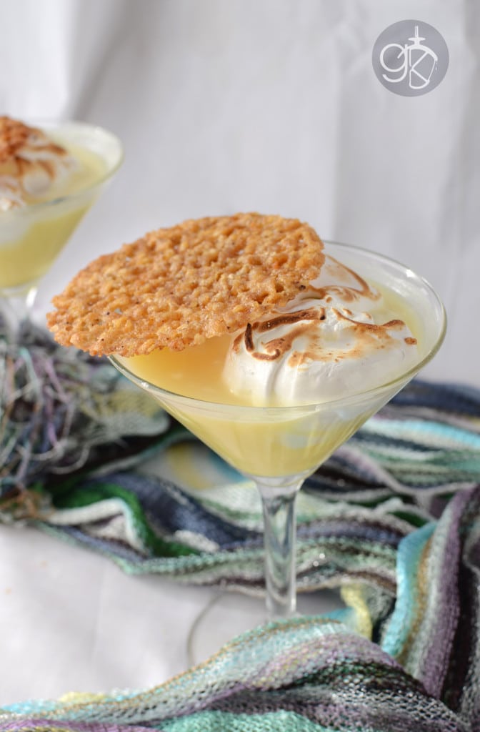 Lemon Meringue Pie Cocktail - A fusion of a cocktail and Lemon Meringue Pie, this Lemon Meringue Cocktail is creamy, topped with a sweet meringue and a lemon and oat lace cookie "crust".