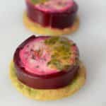 Pickled Beet Jelly with Goat cheese and Candied Pistachios