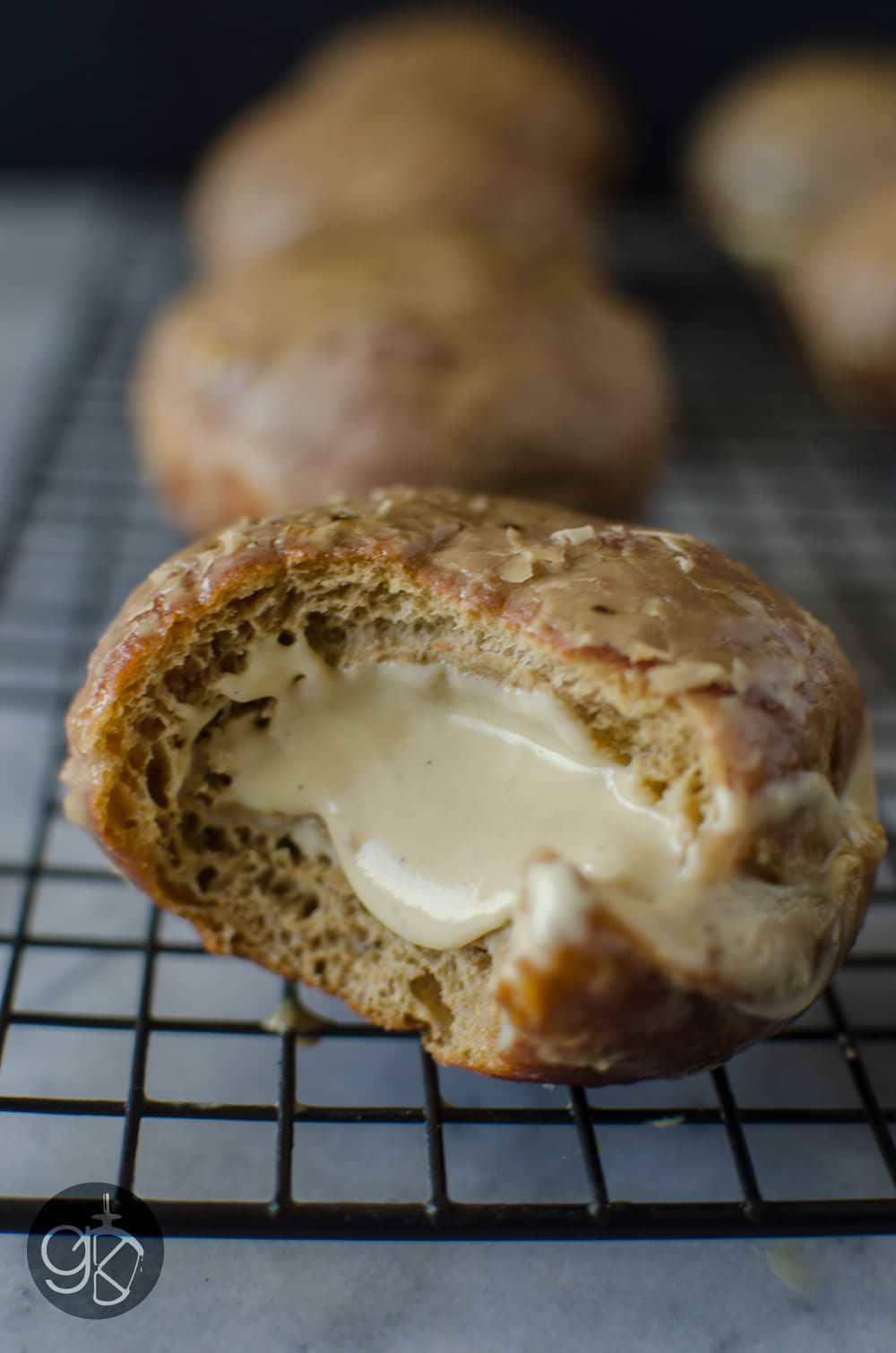 Glazed Coffee Doughnuts with Caramelized White Chocolate Pastry Cream Filling -These Coffee doughnuts (Or coffee donuts) are the more indulgent way to start your day! Coffee and donuts all rolled into one with Caramelized white chocolate to make it even better! Plus a tutorial and tips to make perfect fried doughnuts