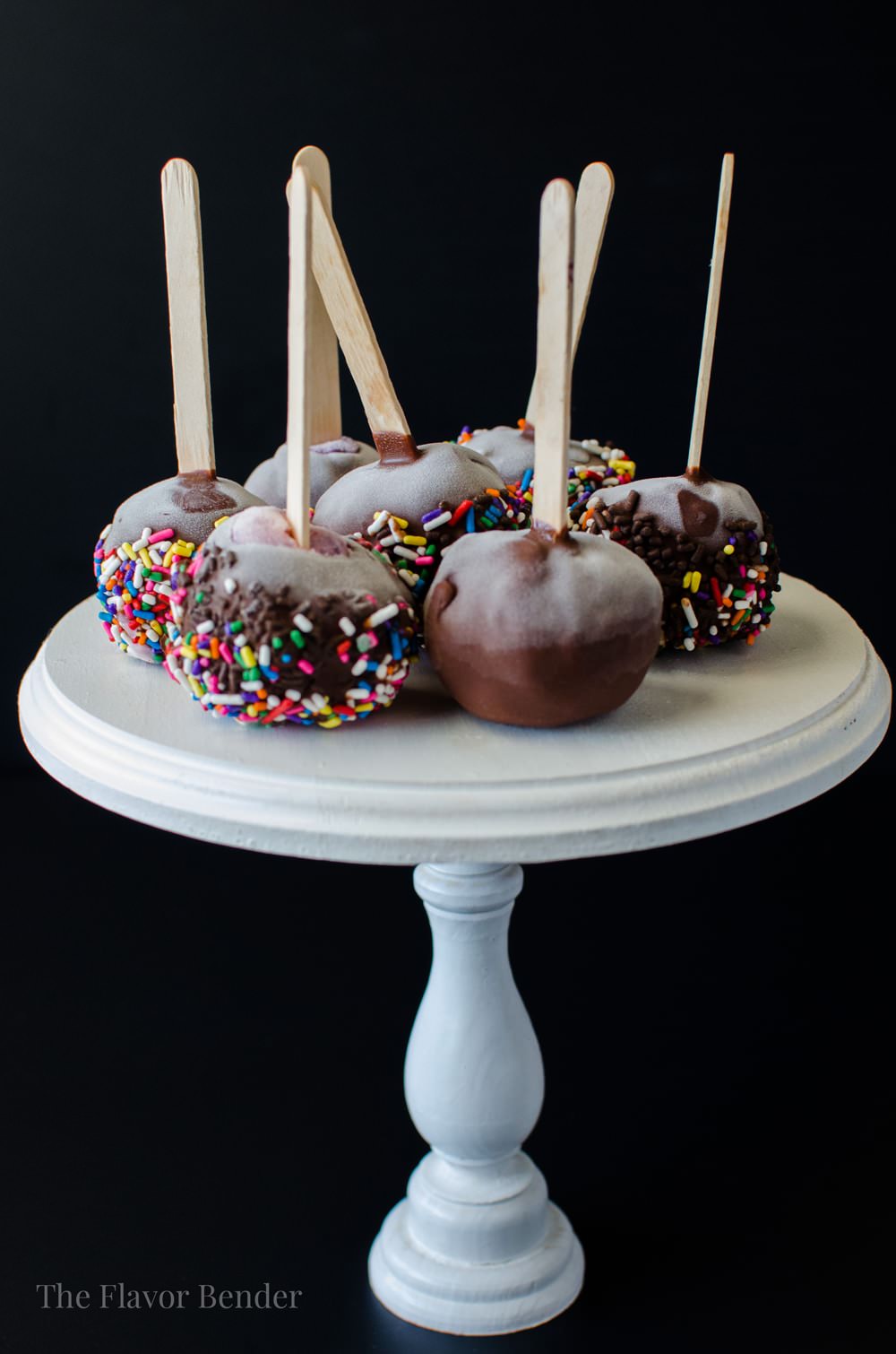 Froyo and Ice Cream Pops with Chocolate Dipping Station - Make your own delicious Swirled Froyo Or Ice Cream Pops for your summer parties, Kids parties with a Chocolate dipping station complete with Chocolate Magic Shell and all sorts of toppings for your guests to choose from! It's fun and delicious!