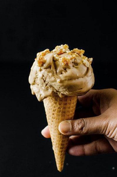 Vegan Cardamom Spiced Coconut Ice Cream - (aka - Watalappan Ice Cream) A Sri Lankan Classic dessert turned into an ice cream that has no dairy and no eggs (Vegan). Insanely creamy, with a touch of spice and topped with a sweet and crunchy Cardamom and Cashew Praline!