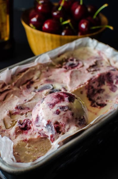 A delicious new Ice Cream for Summer! Kahlua and Cherry Ice Cream! Sweet, Cherry compote swirled through creamy ice cream spiked with Kahlua that gives it a hint of coffee. Can easily be non alcoholic by substituting the Kahlua!