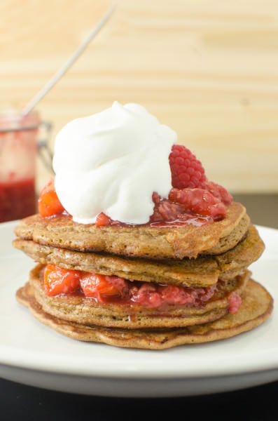 Coffee Pancakes with Peach & Raspberry compote & topped with Brown butter butterscotch sauce! Fluffy, light, delicious, pancakes with amazing depth of flavor.