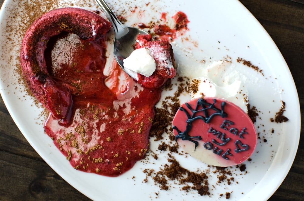 Raspberry White Chocolate Lava Cake {The Bleeding Heart Cake} - A delightfully decadent cake that tastes delicious and appropriately disturbing for halloween or valentines! The perfect dessert for the overly attached girlfriend!