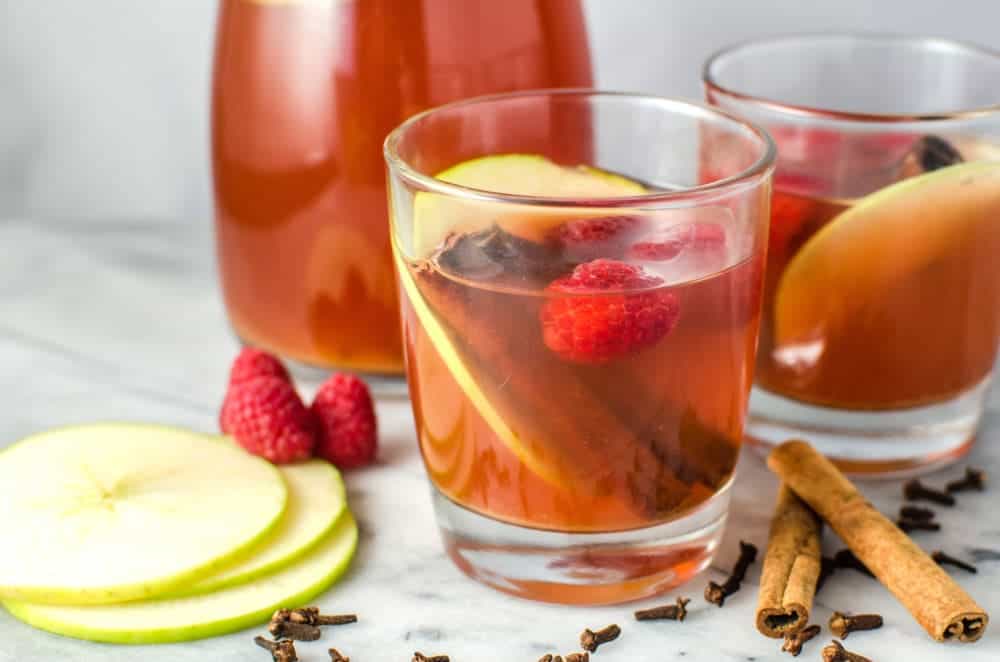 This Spiced Raspberry Apple Cider - will take your regular apple cider to another level! Not only does it look beautiful with the red hue, the raspberries add a delicious berry flavour with tang! Plus that maple syrup makes it even better!
