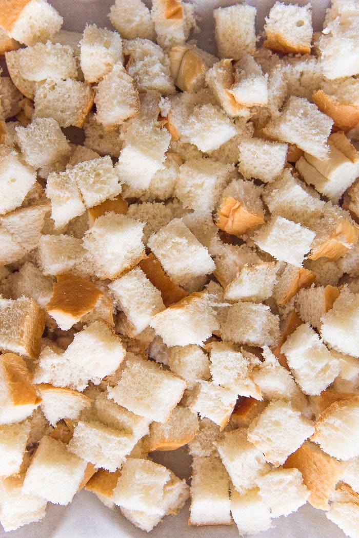 Making croutons with fresh bread. It makes the stuffing taste even better. 