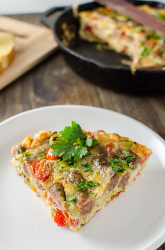 Sausage Frittata with Persimmon Salsa - A luscious, creamy, flavorful Frittata studded with breakfast sausages and Bucheron goats cheese. Plus a sweet Persimmon Salsa to go with the frittata or on top of toasted French bread to make Bruschetta. This Sausage Fritta with Persimmon Salsa is quick, easy, nutritious and oh so tasty!