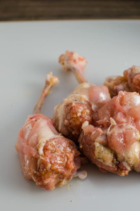 Boneless Cheese Stuffed Chicken Wings - These are no ordinary Chicken Wings! These are boneless Chicken wings STUFFED with gooey melted cheese AND Pork (or chicken)!. These Boneless Cheese Stuffed Chicken wings are indescribable and absolutely delicious!