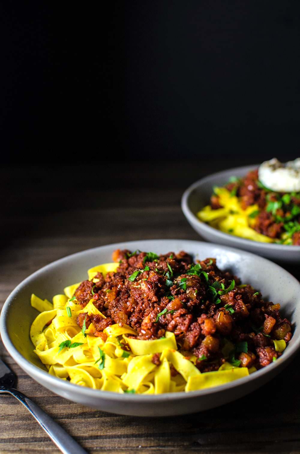 Apricot and Chorizo Bolognese - an easy dinner recipe that can be made with homemade or storebought pasta! Sweet and smoky flavors of this pasta dish will win you over in a snap!