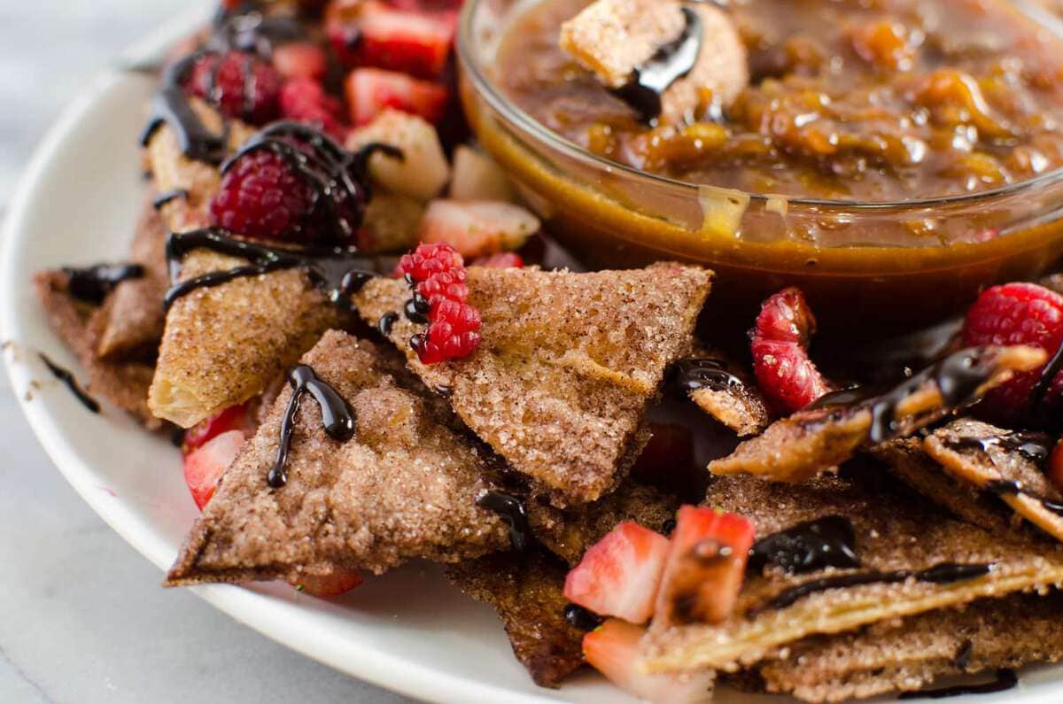 Cinnamon Dessert Nachos with Salted Caramel Apple Dip (Plus Chocolate Fudge sauce and Berries) - This dessert version of Cinnamon Dessert Nachos, are taken to the next level with this decadent Salted Caramel Apple dip! But if you want the classic (or both) Just drizzle on some Chocolate Fudge sauce and berries instead 