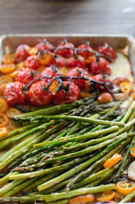 Brown Butter Roasted Vine Tomatoes, Asparagus and Kumquats - This vegetable side dish is simple and easy to make, but has big flavors! From the roasted kumqauts to the brown butter to the roasted garlic! Perfect with Salmon (or any fish), or meat!