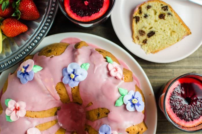 Sri Lankan Breudher Cake with a Blood Orange glaze - a sweet yeasted cake that is PERFECT for Celebrating Easter! A yeasted cake with a touch of sweetness, buttery and rich, studded with raisins, from my childhood, with an extra dose of brandy and blood orange! 