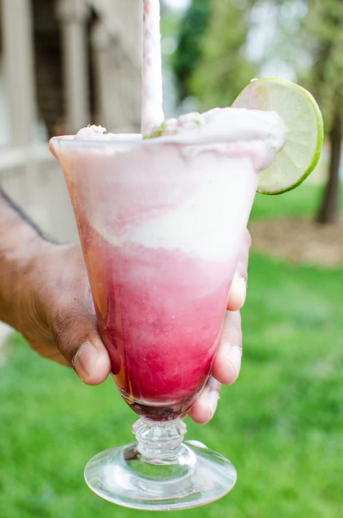 Hibiscus Strawberry Margarita Ice Cream Float - Take your Margaritas to the next level with this simple and delicious twist! Sweetened with a Hibiscus and Strawberry Syrup, plus tequila and a generous scoop of Salted Lime Sherbet this Ice Cream float is the PERFECT treat for Cinco de Mayo or any party! REPIN to save. CLICK to get the recipe! #TheFlavorBender