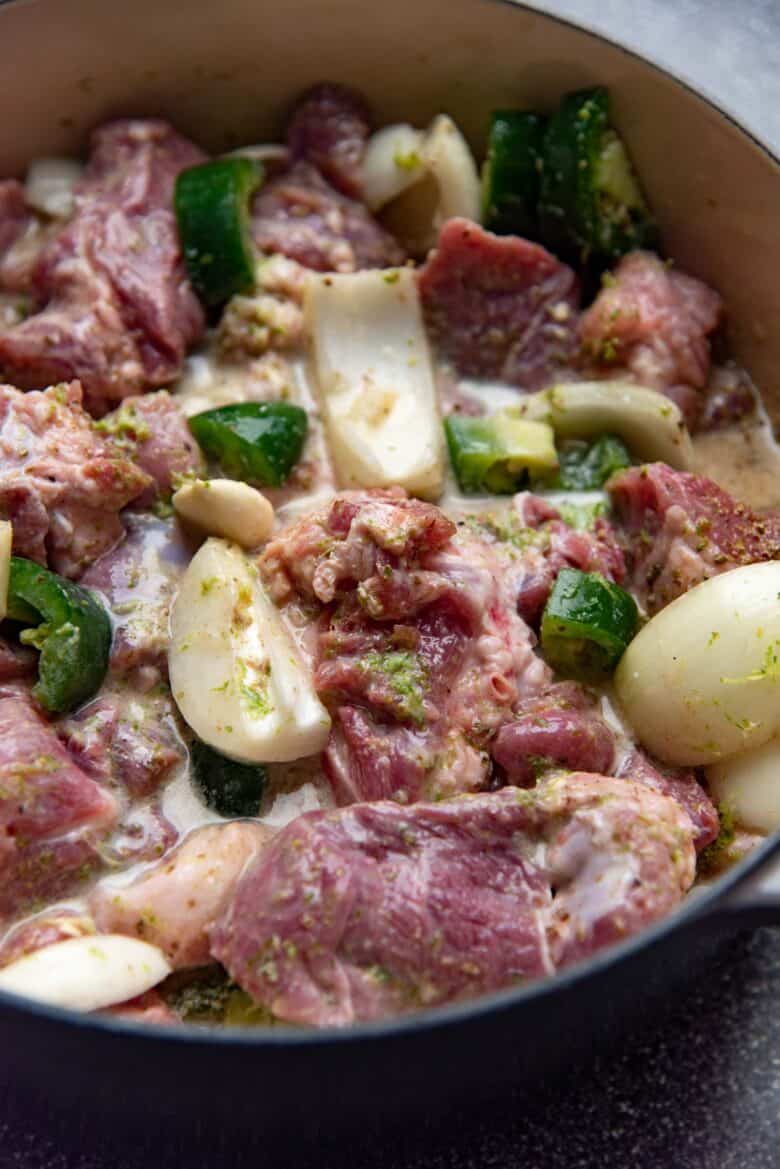 Pork in a dutch oven with other ingredients
