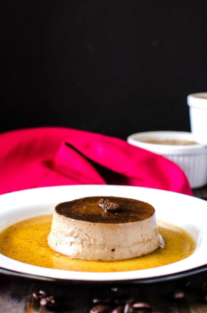 Coffee Flan - Classic Creme Caramel with a wonderful coffee twist! This Coffee creme caramel is made with coffee infused cream! Since it's so easy to make, delicate, super creamy and irrestibly addictive, it is the most requested dessert in our home. REPIN to save. CLICK to get the recipe. #TheFlavorBender