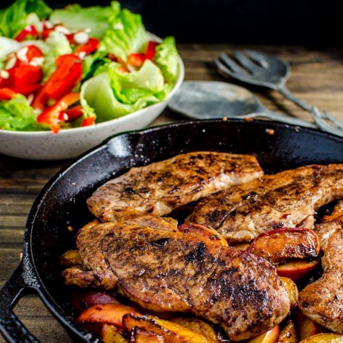 Pan Fried Five Spice Pork And Peaches - Here's your answer to an infinitely flavourful yet quick and easy, 30 minute meal! Pork chops pan fried with Five Spice powder and served with caramelized, sweet peaches! Dinner's ready in less than 30 minutes! CLICK to get the recipe. REPIN to save! #TheFlavorBender #AllNaturalPork [ad]