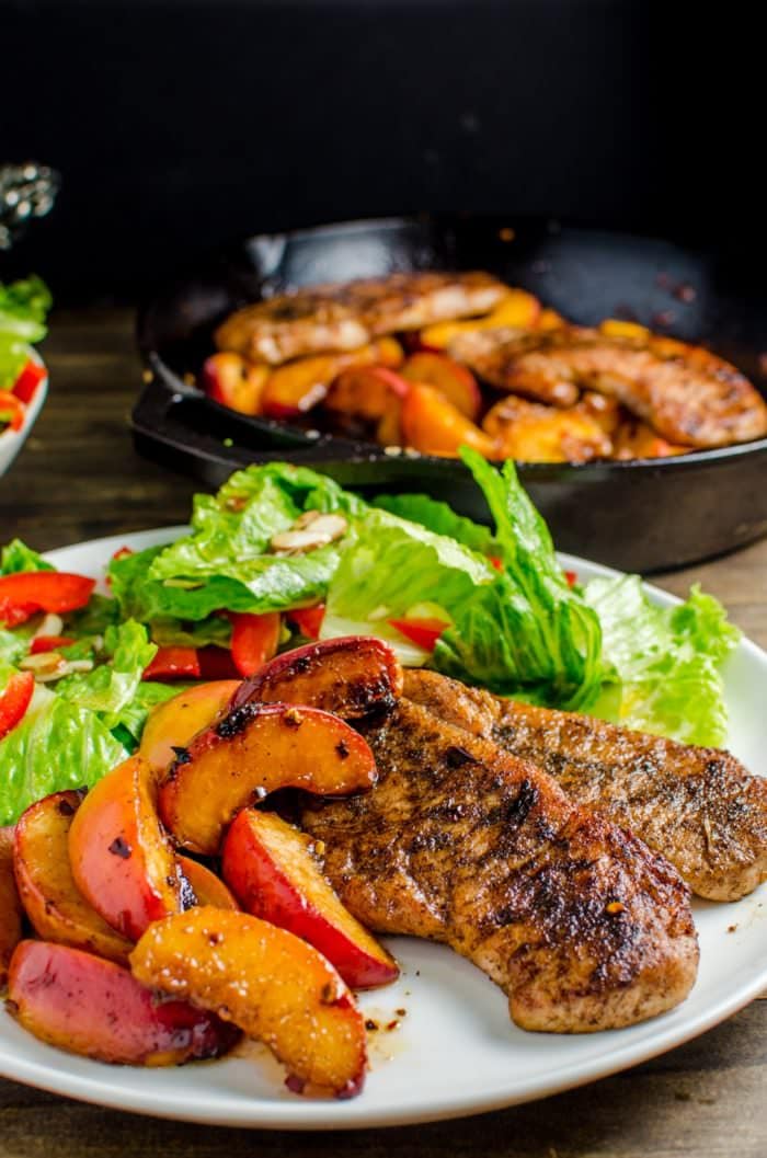 Pan Fried Five Spice Pork And Peaches - Here's your answer to an infinitely flavourful yet quick and easy, 30 minute meal! Pork chops pan fried with Five Spice powder and served with caramelized, sweet peaches! Dinner's ready in less than 30 minutes! CLICK to get the recipe. REPIN to save! #TheFlavorBender #AllNaturalPork [ad]