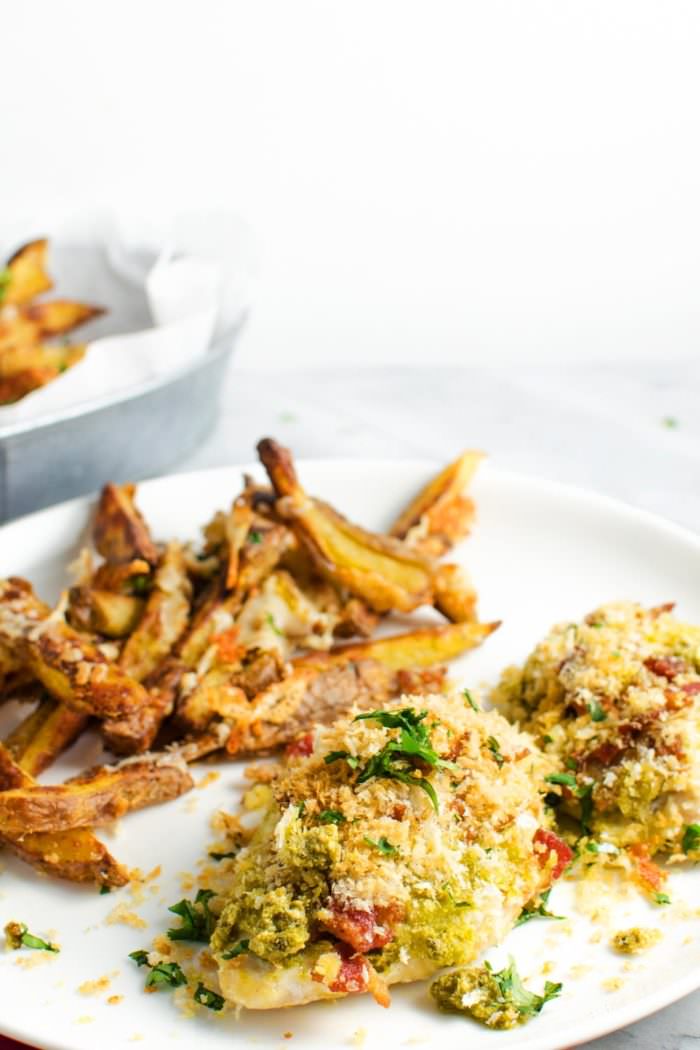 Pesto Bacon Crusted Chicken Breast AND Potato fries - This meal will be ready and on the table in 30 minutes! So easy, and just so flavorful, your family will be asking for it again and again!