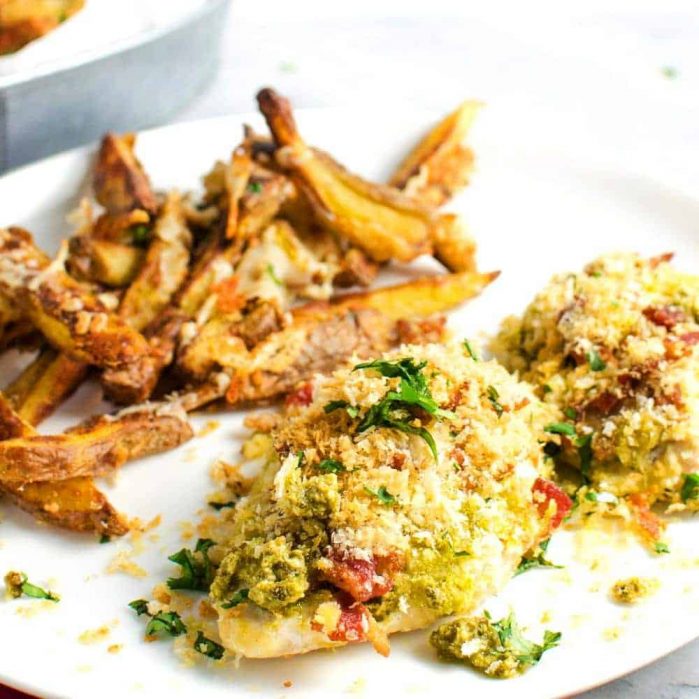 Pesto Bacon Crusted Chicken Breast AND Potato fries - This meal will be ready and on the table in 30 minutes! So easy, and just so flavorful, your family will be asking for it again and again!