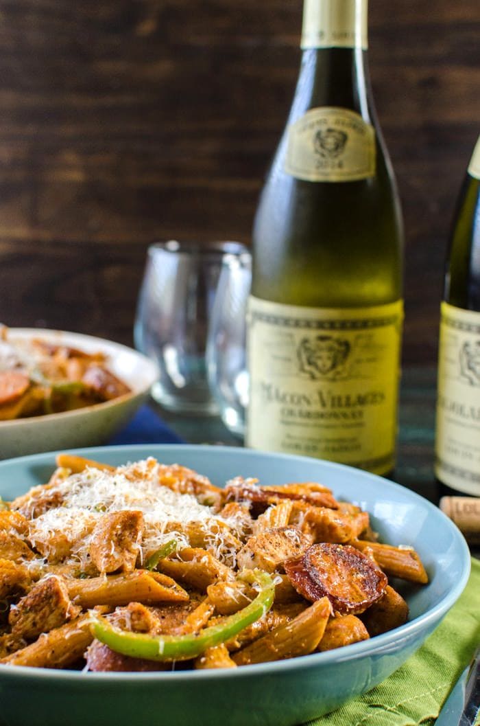 Creamy Chicken and Sausage Cajun Pasta - a spicy, herby, peppery and unabashedly flavourful, easy weeknight or weekend dinner that your whole family will love! Creamy cajun pasta with cajun-style blackened chicken and Andouille sausage. #LoveJadot