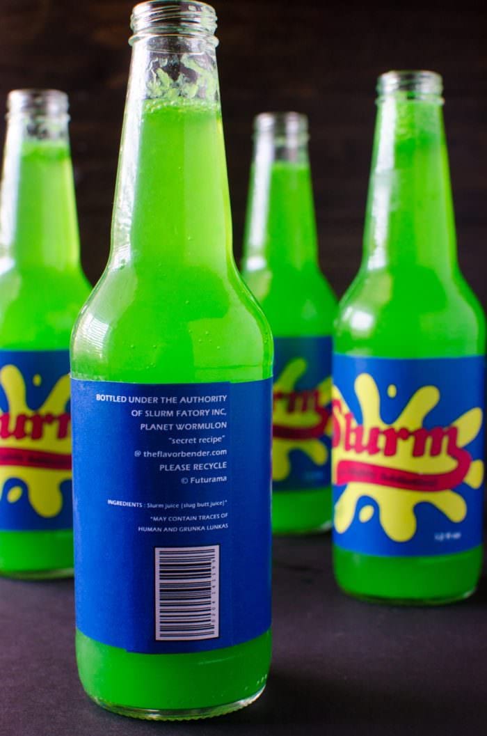 Homemade Slurm Drink from Futurama - sweet, tart, refreshing sparkling limeade with the spicy warmth of ginger! Kids will love the bright green shade and the sweet and tart ginger limeade, or spike it with some vodka for the adults.