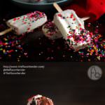Red Velvet Pudding Popsicles - These tangy, creamy, white chocolate magic shell covered,  Buttermilk Chocolate Pudding Popsicles, are simple to make, insanely delicious, and pretty inside and out. Just like the crazy, lovable Harley Quinn!