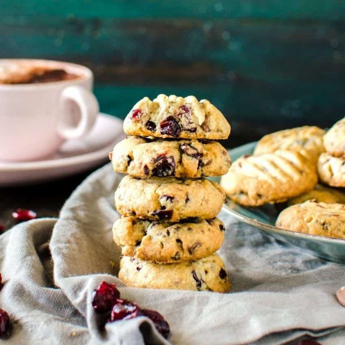 Chocolate Chip & Craisins Shortbread Cookies - Crisp, buttery, crumbly shortbread cookies, studded with bits of milk chocolate and craisins and spiced with warming spices like cinnamon, nutmeg and allspice, that are unbelievably (repeat, unbelievably!) easy to make and great for holiday baking!