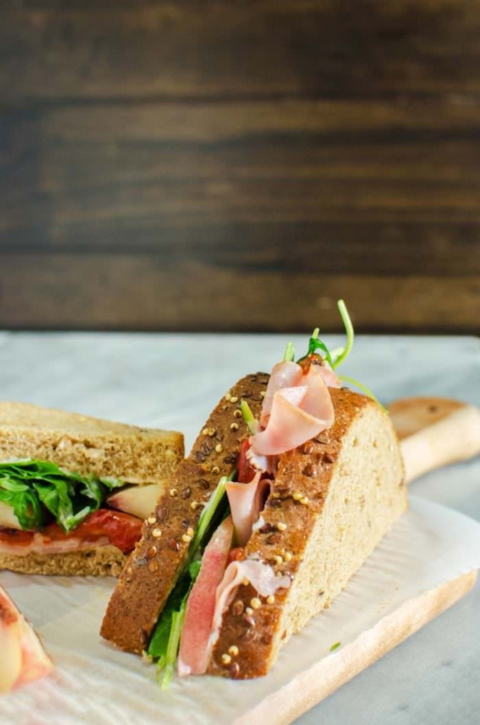 Nectarine Roasted Pepper and Ham Sandwiches are the perfect Summer Lunch idea! Packed with fruits and veggies and bright flavors and delicious thinly sliced honey ham and creamy mayonnaise! #SandwichWithTheBest #ad @PepperidgeFarm @TheFlavorBender