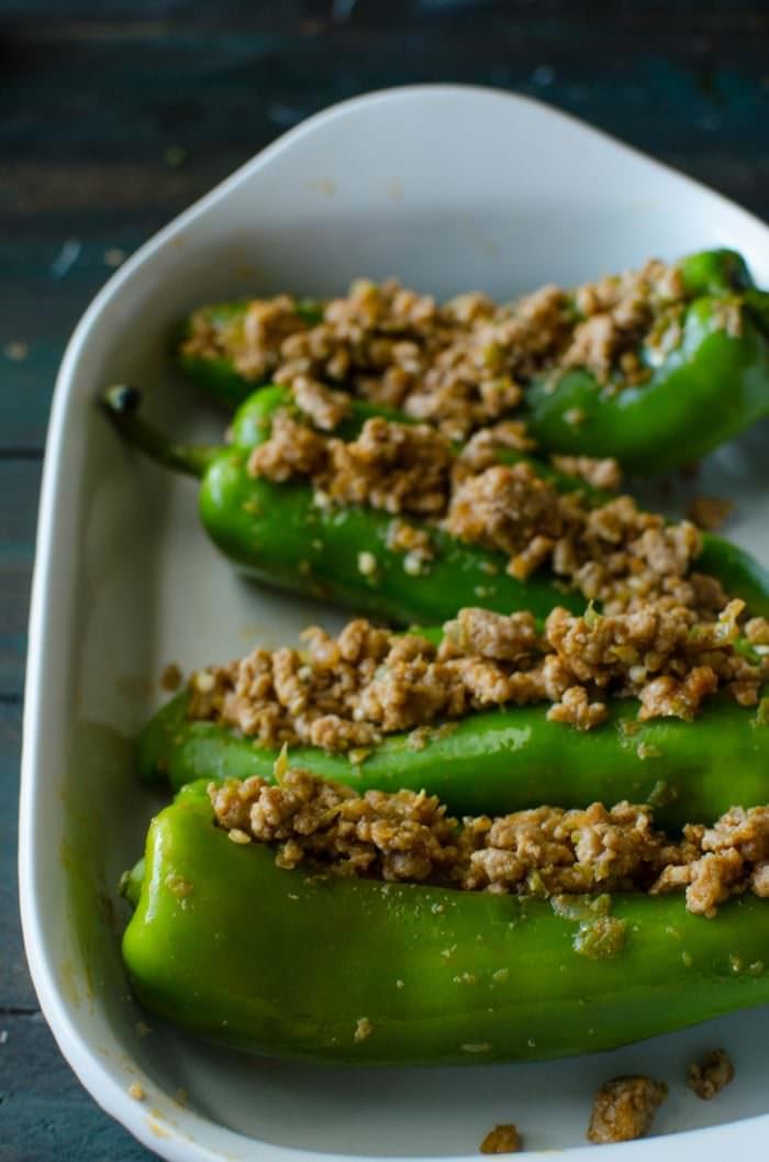  Spiced Pork Stuffed Hatch Chile - Spicy, smoky, a little sweet, a lot succulent. Incredibly delicious and super easy to make! Great way to use up hatch chiles, and if you don't have access to those, simply substitute with anaheim, poblano or even green bell peppers. This is comfort food with some amazing Mexican flavors that your whole family will love!