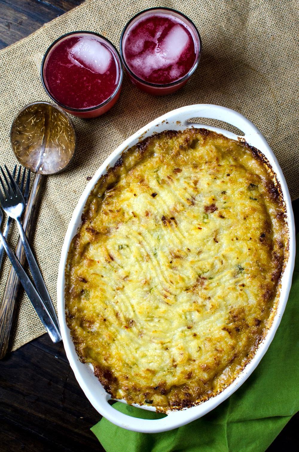 This Creamy Turkey Shepherd's Pot Pie topped with cheese, bacon and creamy mashed potato, and then baked until the potatoes turn a light golden brown, will have you counting down the days for the day after thanksgiving!