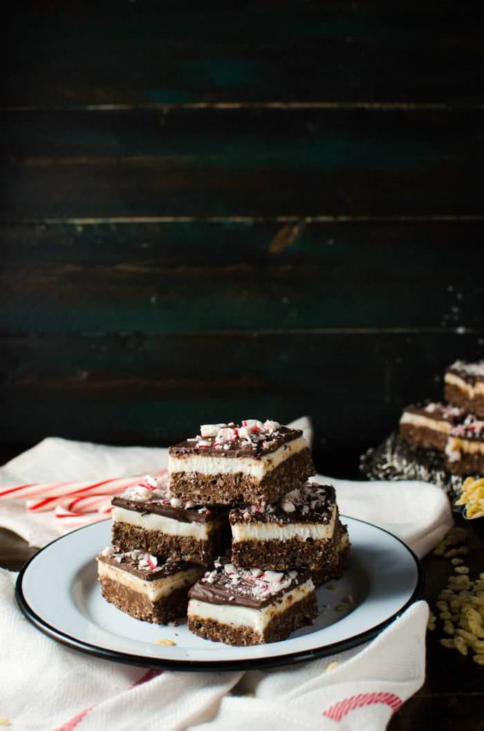 Chocolate Peppermint Rice Krispie Treats - These Rice Krispie Bars have a crunchy, cripsy dark chocolate rice krispie base with a soft refreshing peppermint center and topped with a thin layer of dark chocolate! An addictive Chocolate peppermint treat that's perfect for the holidays and for gift giving! Easy to make and kid-friendly. Gluten free and vegan!