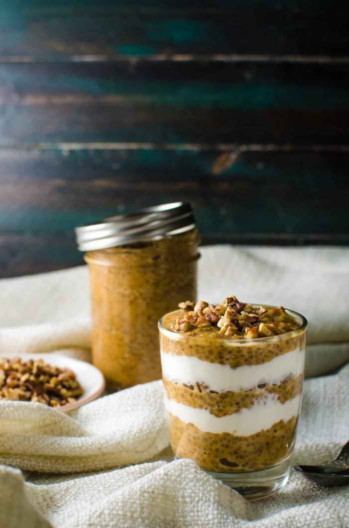 Overnight Pumpkin Pie Chia Pudding Parfait - the ultimate make-ahead, healthy, delicious breakfast! Full of fiber, protein and all the cozy flavors of Fall, the holidays and pumpkin pie, this parfait is gluten free, paleo-friendly and vegan friendly. 