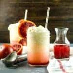 Blood orange float topped with vanilla ice cream served in a glass jar.