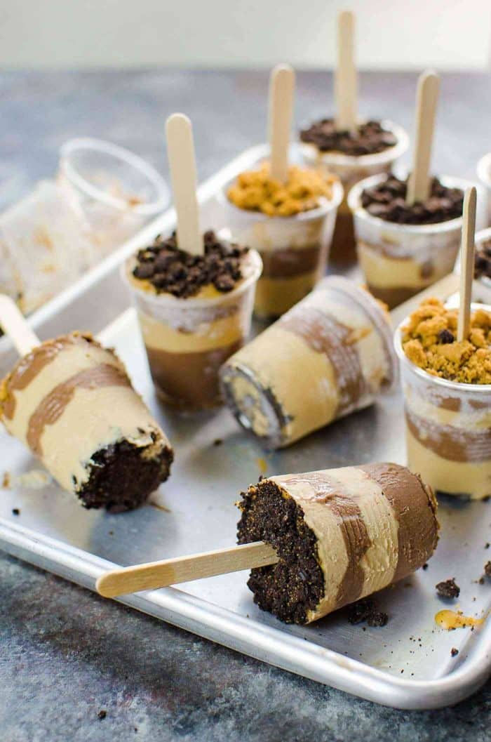  Cookie Butter and Chocolate Fudge Pops - Melt in your mouth creamy, smooth, sweet and salty Cookie Butter and Chocolate Fudge Pops - These popsicles are made in disposable cups, and these cups can be removed from the Popsicles easily, and make great layers!