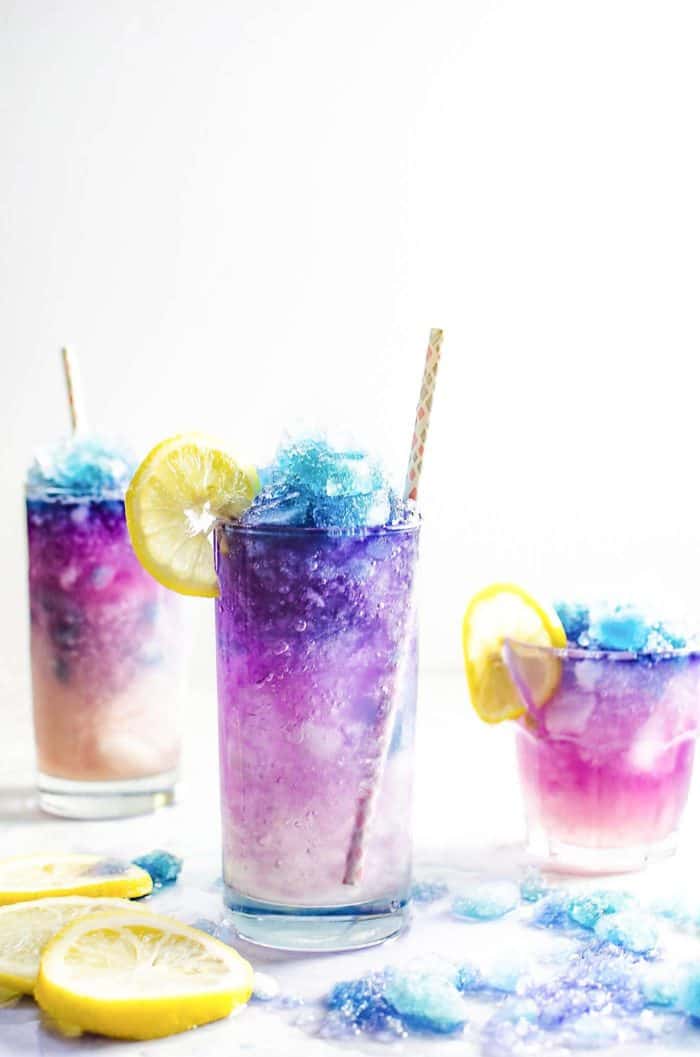 Color Changing Galaxy Lemonade Slushie - There's no food coloring in this Color Changing Lemonade Slushie! Just a dash of magic from magic ice and delicious lemonade that kids and adults will love. The ultimate Summer Lemonade drink!