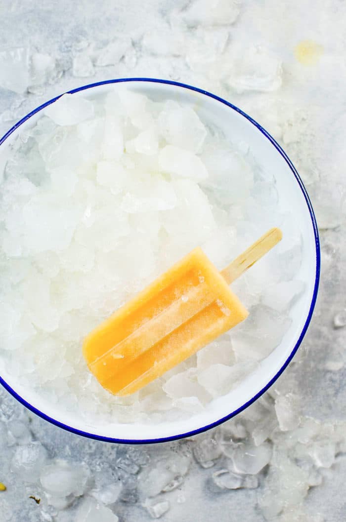 Lychee Cantaloupe Popsicles - Keep your cool this summer with these refreshingly sweet, fruity Lychee Cantaloupe Popsicles! Super easy to make, with seriously amazing flavor that changes as you enjoy this frozen treat!
