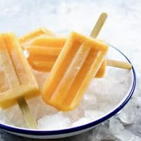 Lychee Cantaloupe Popsicles - Keep your cool this summer with these refreshingly sweet, fruity Lychee Cantaloupe Popsicles! Super easy to make, with seriously amazing flavor that changes as you enjoy this frozen treat!