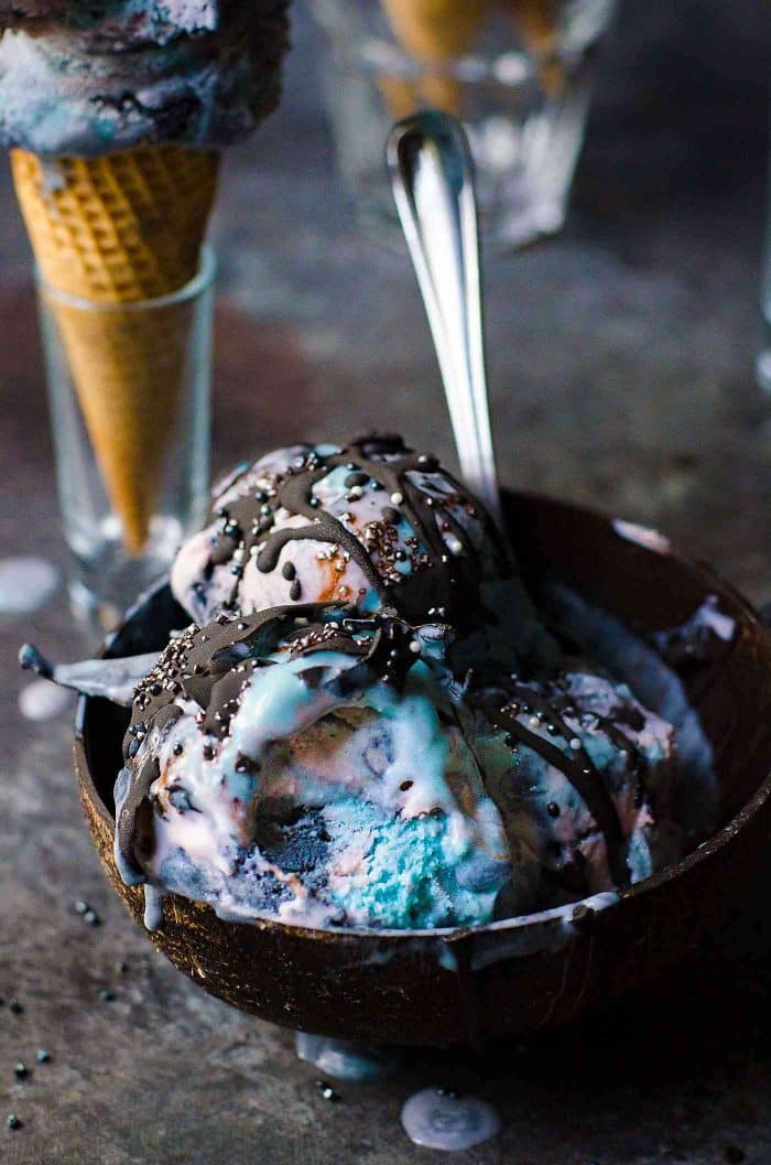No churn Galaxy Ice cream – All natural (no food coloring) pink, purple, blue and black swirls of berry and lemon ice cream, drizzled with a galaxy chocolate magic shell sauce and space funfetti! Perfect for birthday parties, or just for fun!