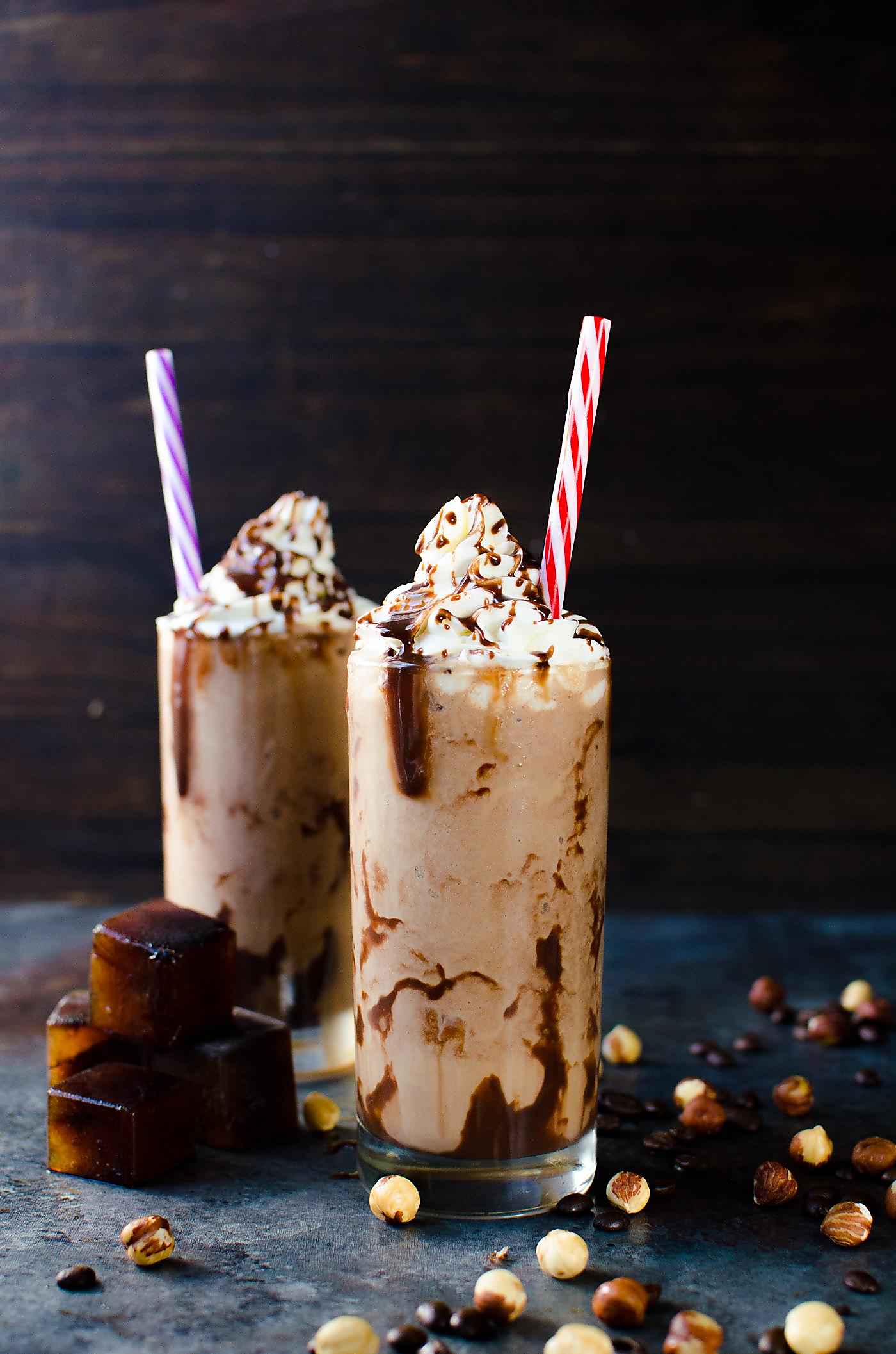  3 ingredient Nutella Frappuccino - This amazing Nutella Coffee Slushie is a cross between an icy frappuccino and a creamy milk shake, but with the added delicious hazelnut cocoa flavor of Nutella and a nice strong hit of coffee! Mornings have never been this good!