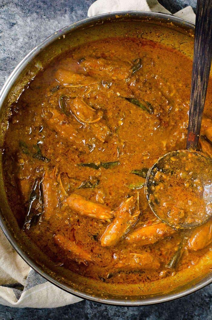Authentic Sri Lankan Prawn Curry (Shrimp curry) - Learn all the tips and secrets into making the best spicy and creamy prawn or shrimp curry in your life! The gravy is simmered with the shrimp heads for extra flavor. The shrimp heads can be eaten, or removed before adding shrimp. 