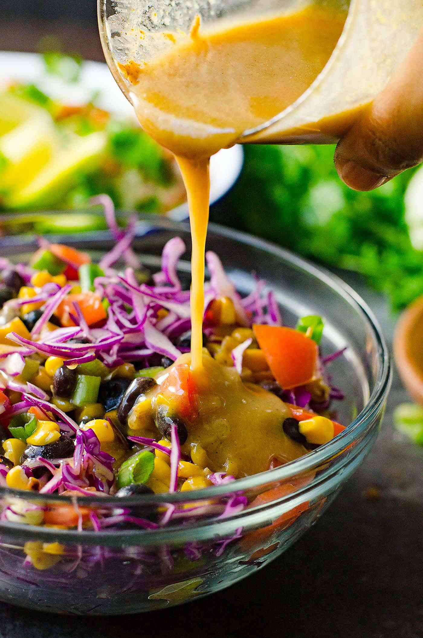 Rainbow blueberry coleslaw with a fresh almond honey mustard dressing! It's a creamy, nutty dressing with no mayonnaise, perfect for any salad!