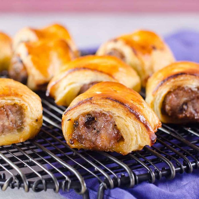 Easy Sausage Rolls with just 3 ingredients - You can customize these sausage rolls easily with your favorite flavor pairings, and they can be made ahead of time and frozen for later too. Easy pork sausage rolls that are perfect for holiday entertaining, as an appetizer or as a brunch or lunch snack!