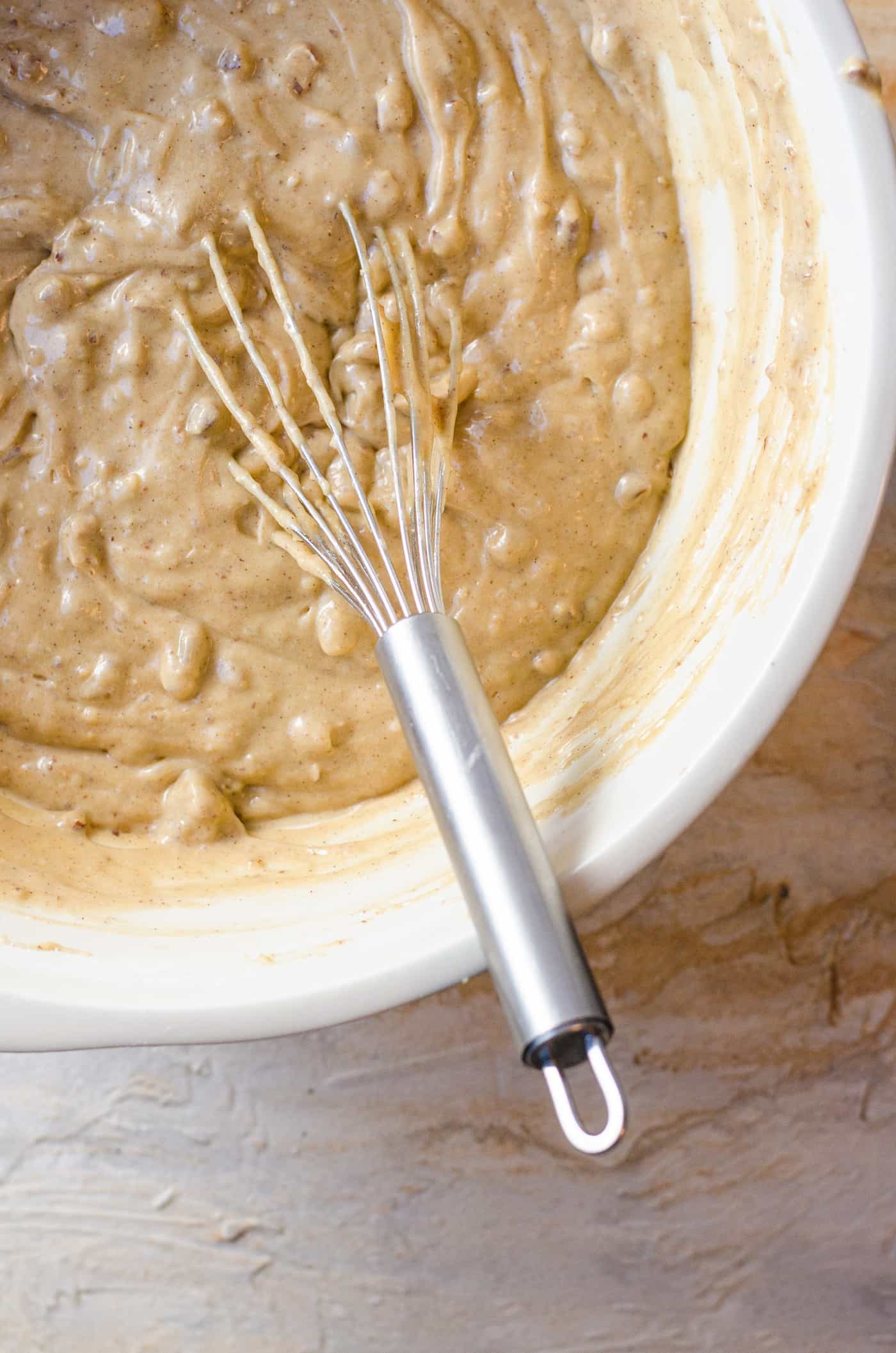 Spiced Bourbon Butter Pecan Cake with Brown Butter Maple Frosting - Butter pecan cake batter ready to be divided.