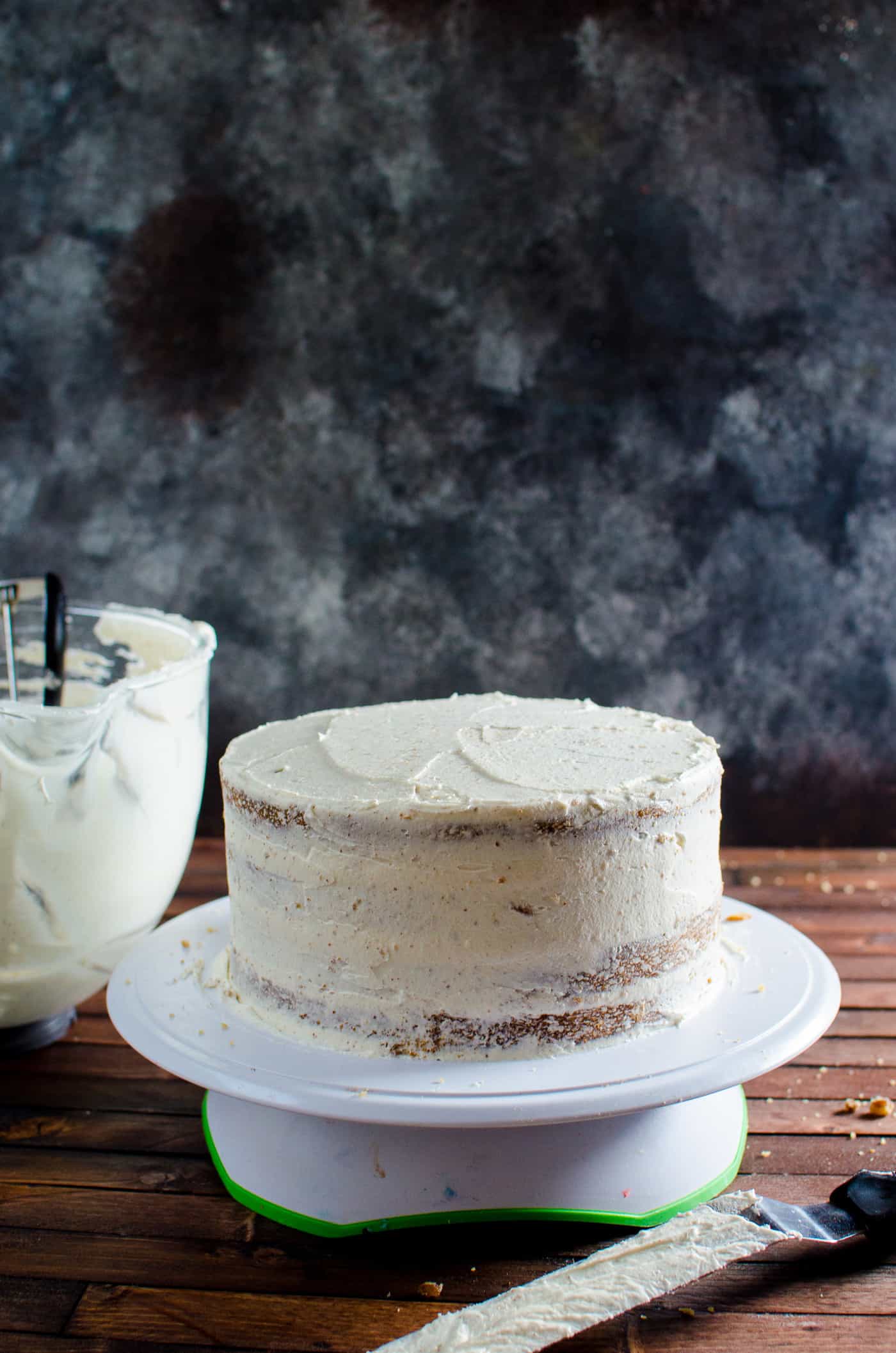 Spiced Bourbon Butter Pecan Cake with Brown Butter Maple Frosting - Crumb coating of the brown butter maple frosting.