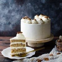 Spiced Bourbon Butter Pecan Cake with Brown Butter Maple Frosting - A fall cake that's perfect for thanksgiving dessert.  Flavors of a pecan pie in a cake with nutty, sweet and spiced flavors. 