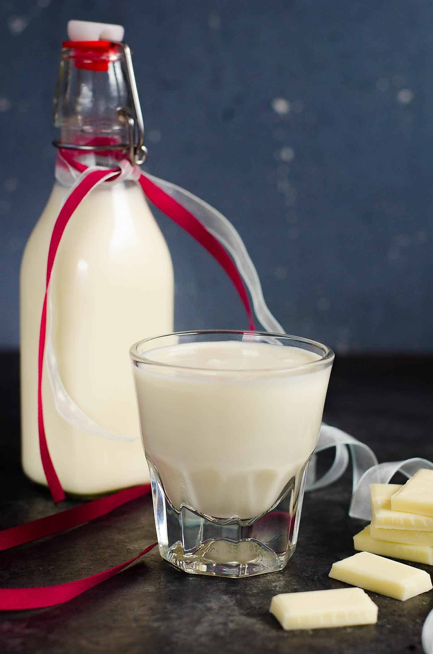 The BEST homemade white chocolate liqueur that is so easy to make, and absolutely delicious with extra white chocolate flavor! It's NOT sickly sweet, but still has the creamy taste of white chocolate! Far better than store bought too.