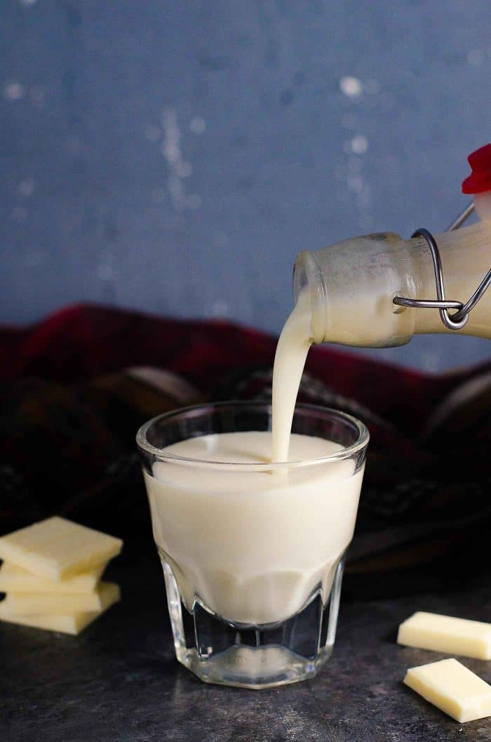 The BEST homemade white chocolate liqueur that is so easy to make, and absolutely delicious with extra white chocolate flavor! It's NOT sickly sweet, but still has the creamy taste of white chocolate! Far better than store bought too.