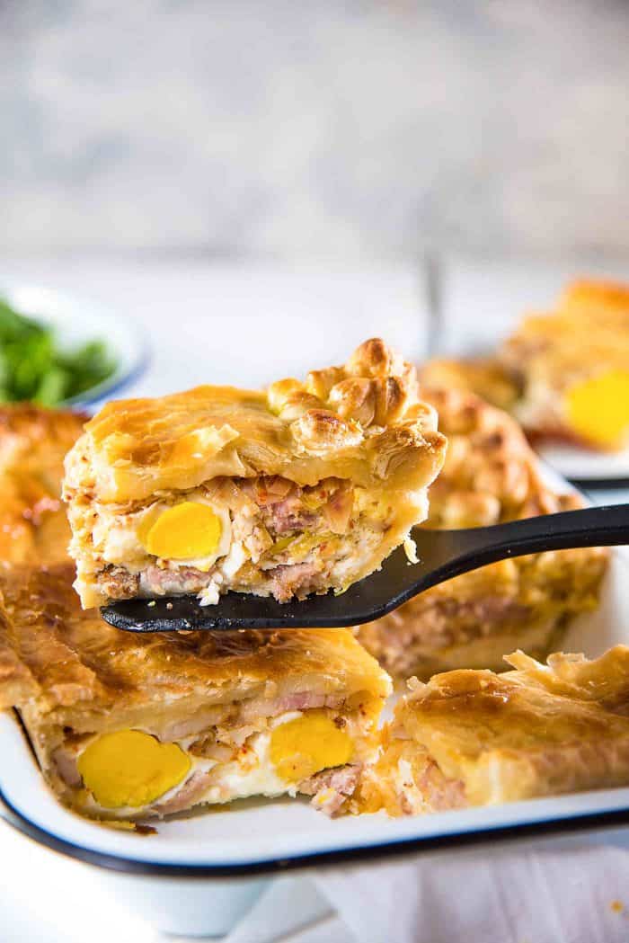 Ultimate Bacon and egg pies (breakfast pies) are a New Zealand classic with smokey bacon and eggs, leeks, cheese and flaky puff pastry! Perfect for breakfast, brunch or even as breakfast for dinner!