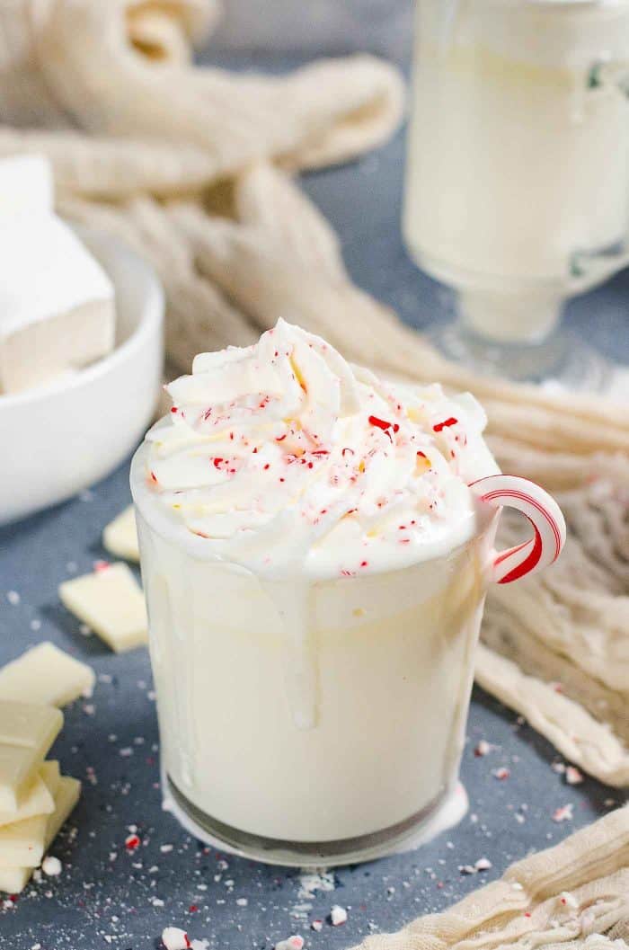 Rum and Peppermint White Hot Chocolate - A boozy twist on the classic with refreshing peppermint flavor! So creamy and not too sweet and perfect for winter!